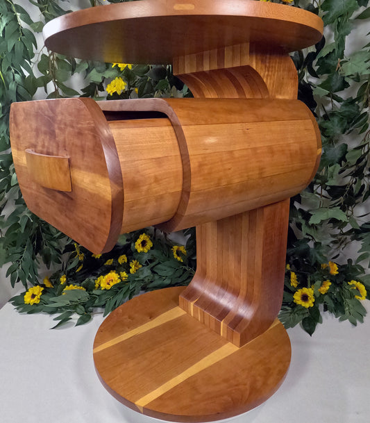 Wooden pedestal table with decorative background